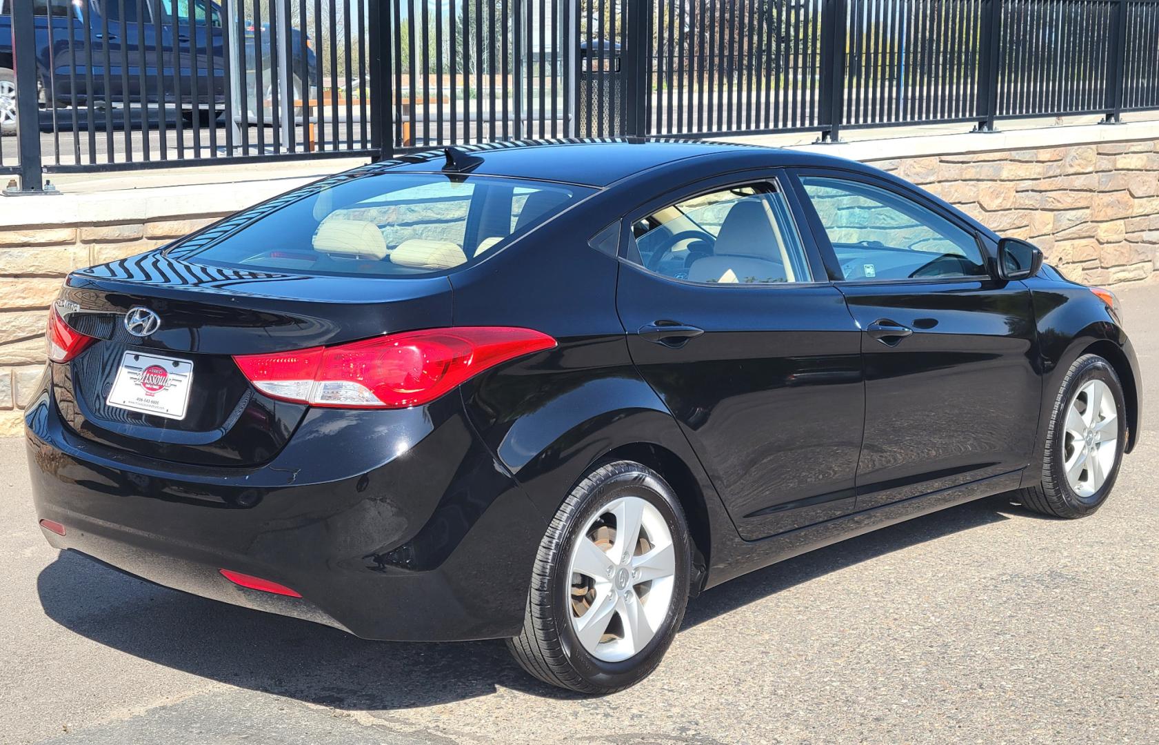 2013 Black /Tan Hyundai Elantra GLS (KMHDH4AE8DU) with an 1.8L I4 engine, 6 Speed Auto transmission, located at 450 N Russell, Missoula, MT, 59801, (406) 543-6600, 46.874496, -114.017433 - Low Mile Front Wheel Drive Sedan. One Owner. Excellent Fuel Economy. 1.8L I4 Engine. 6 Speed Automatic Transmission. AirConditioning. Power Windows and Locks. Bluetooth. - Photo#1